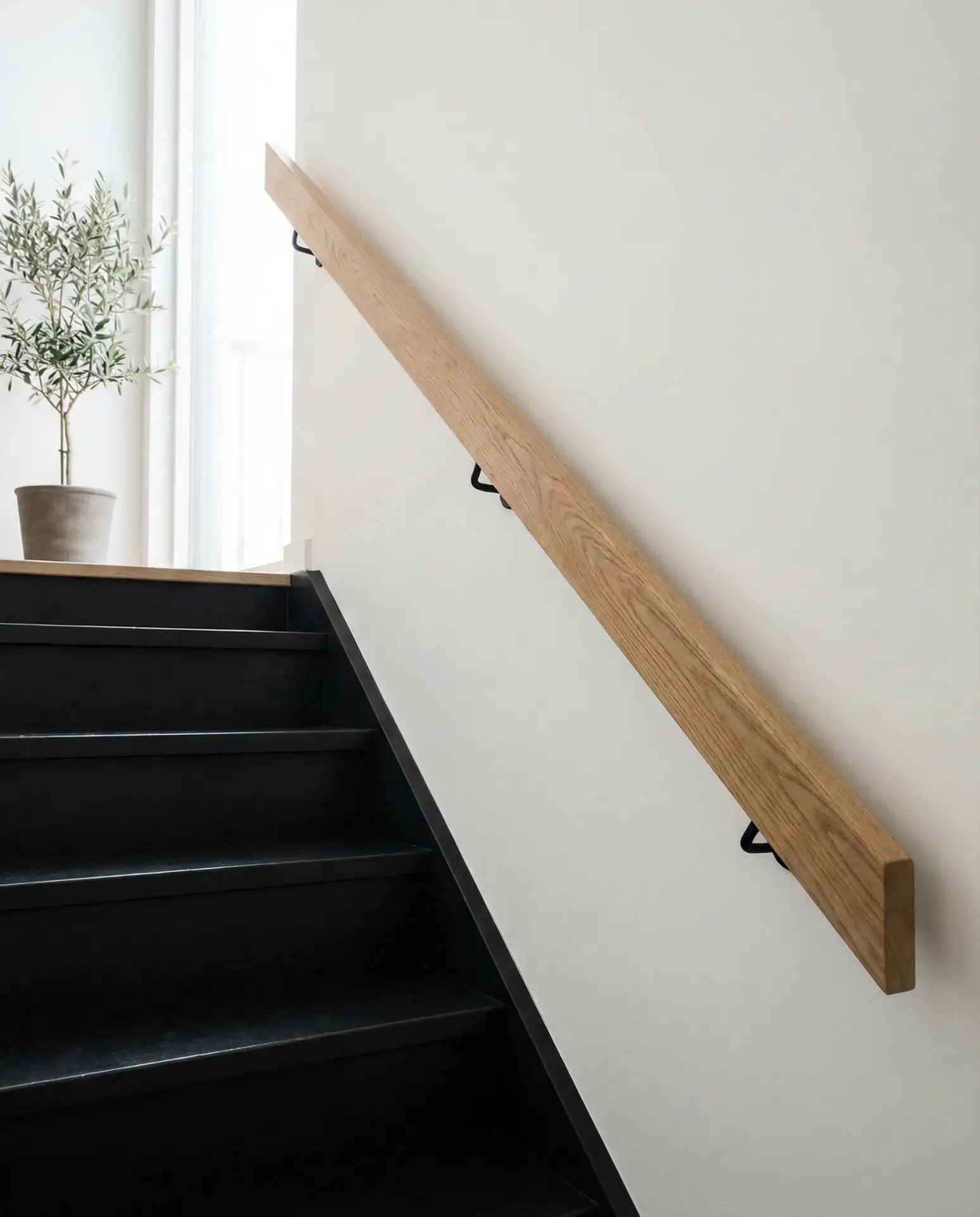 Black Painted Staircase with Natural Wood Handrail 1
