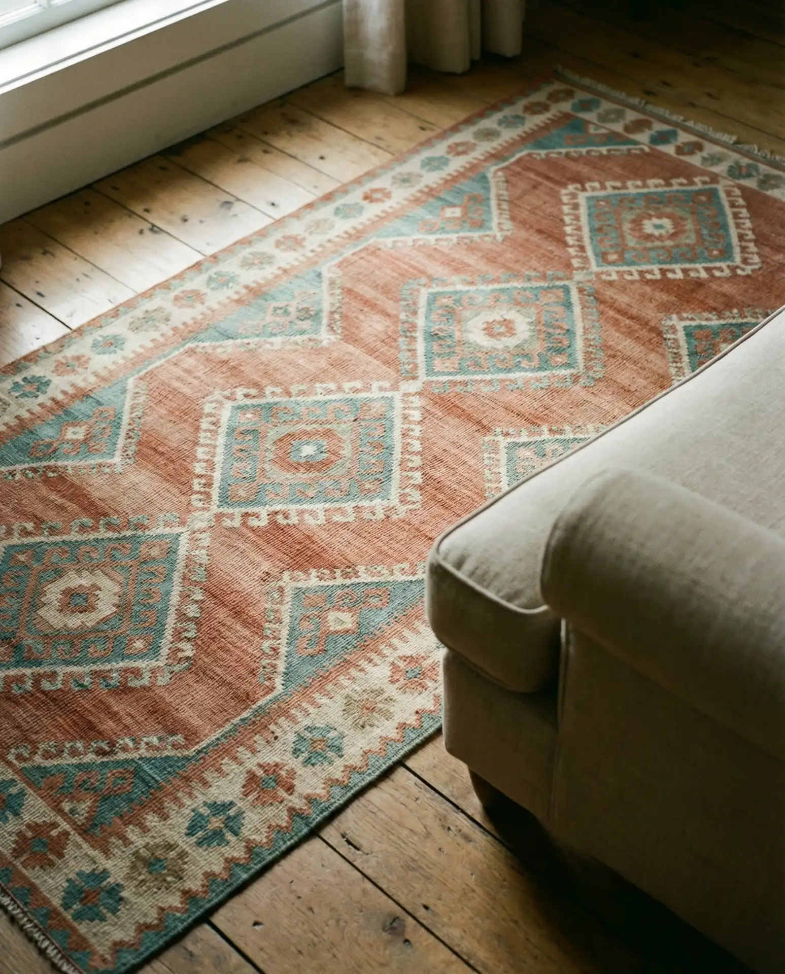 Colorful Vintage Rugs Layered on Hardwood 1