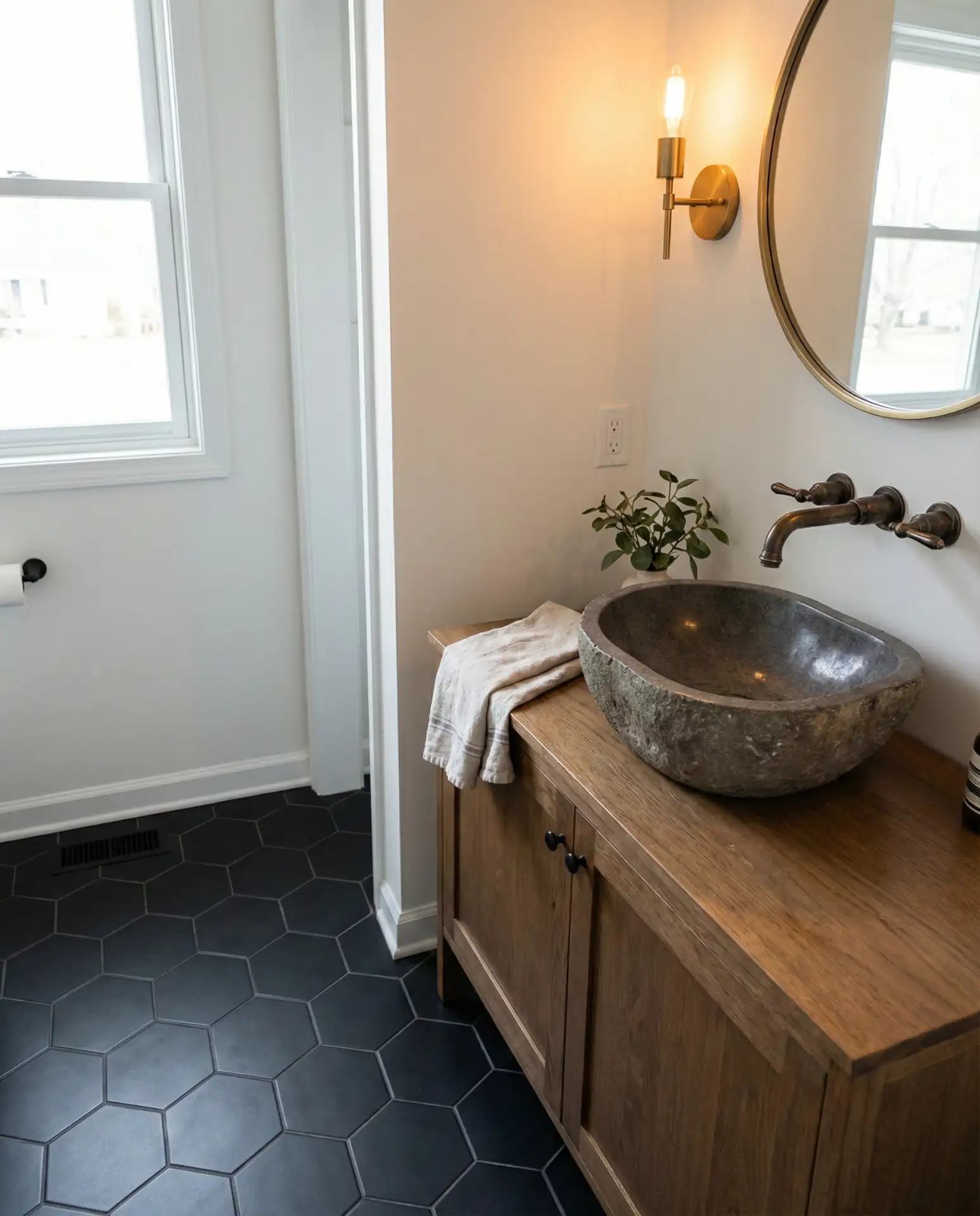 Edgy Western Bathroom with Black Tile and Iron 2