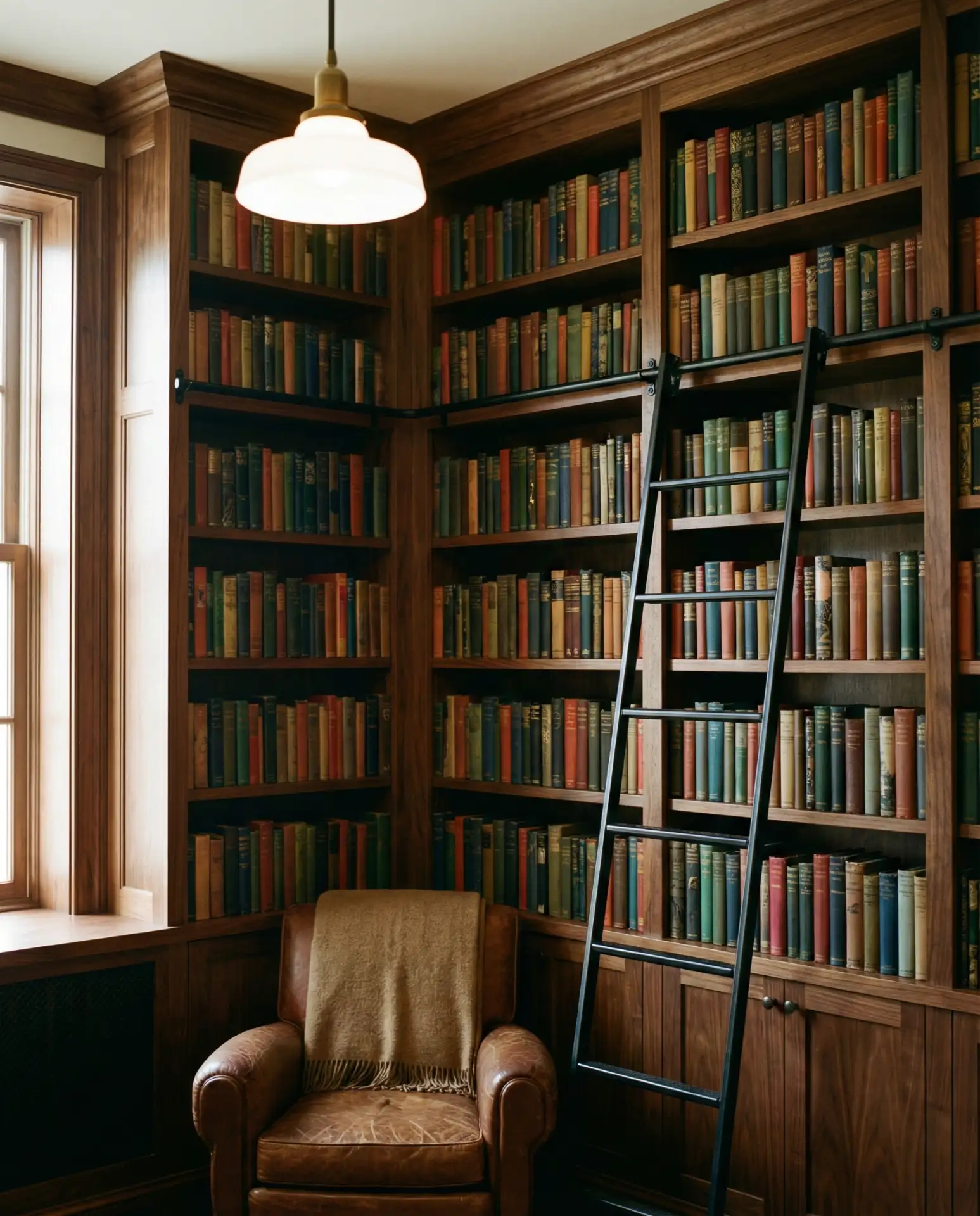 Floor-to-Ceiling Built-In Shelving with Rolling Ladder 2