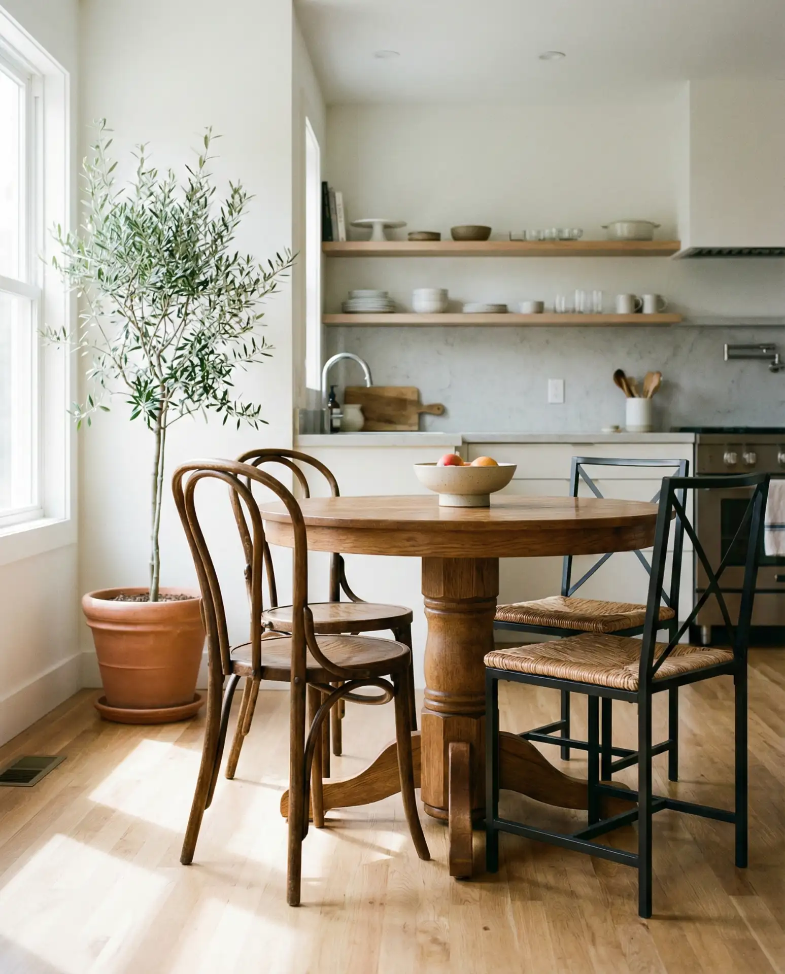 Four-Seater Round Table for Intimate Dining 2