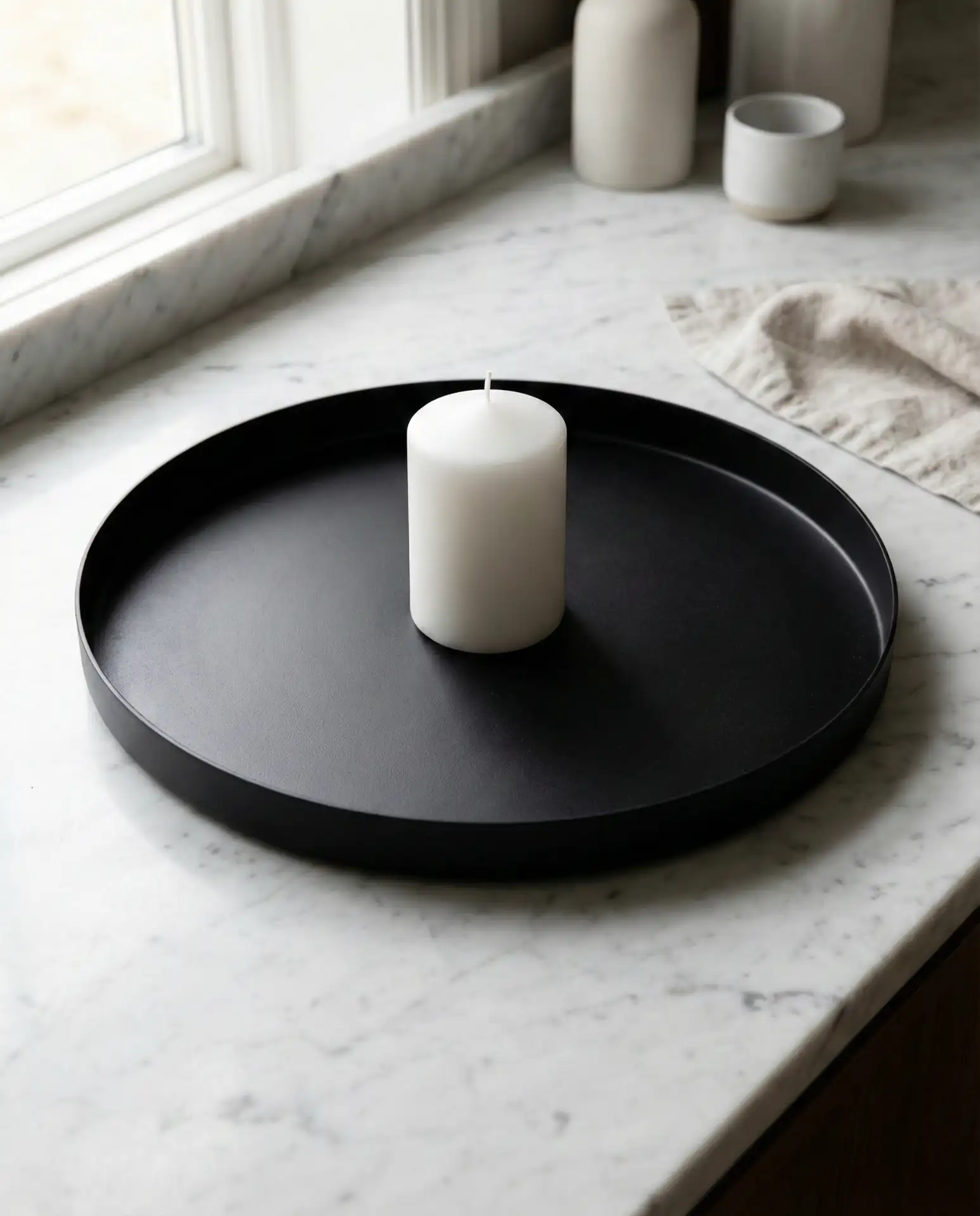 Minimal Black Tray with a Single Candle 1