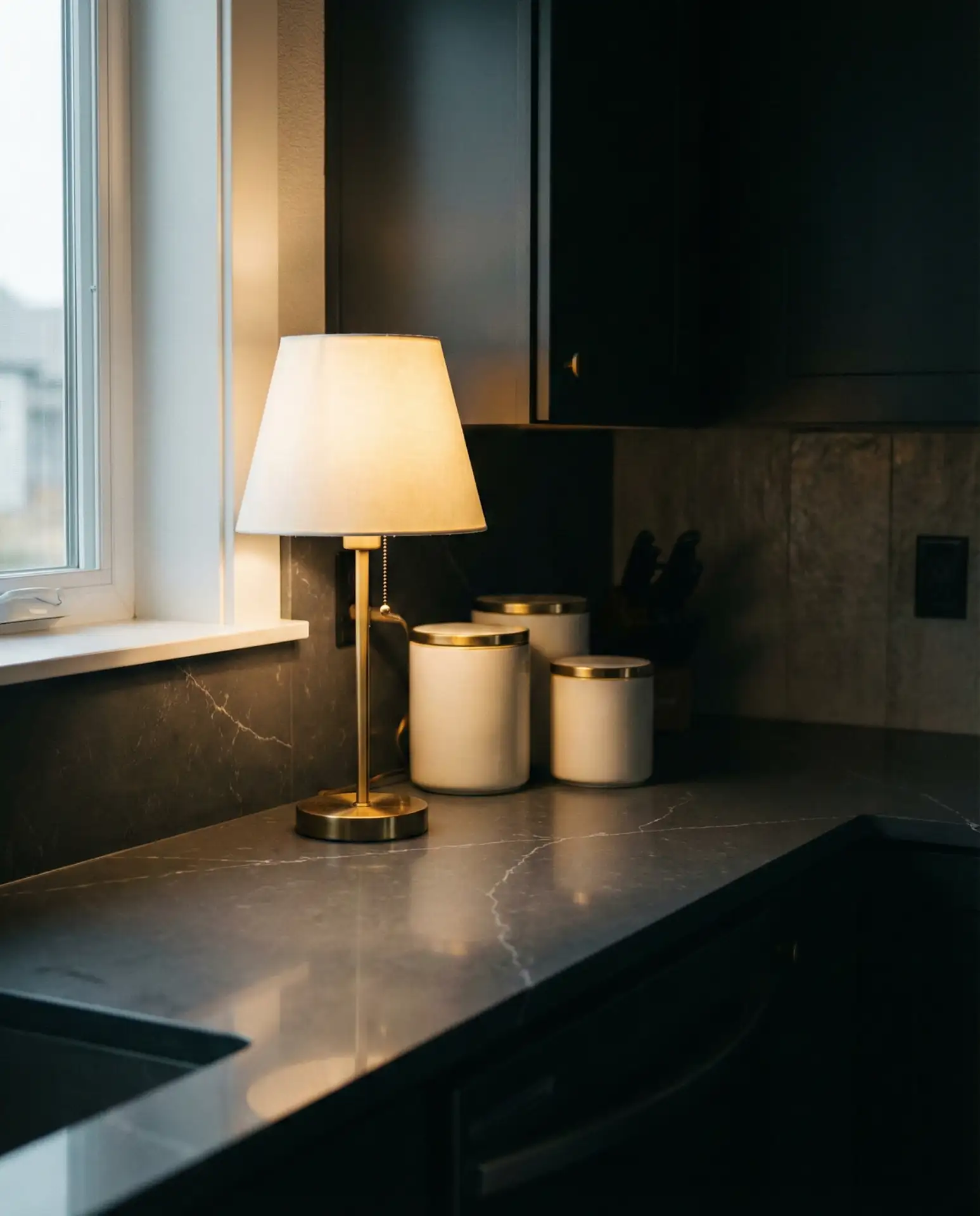 Moody Dark Counters with Brass Accents 1