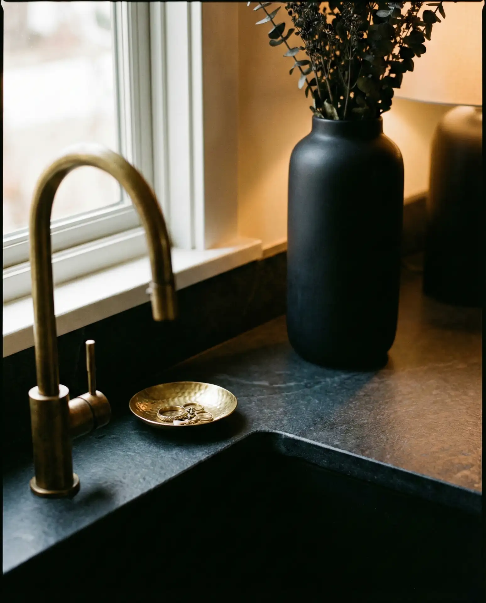 Moody Dark Counters with Brass Accents 2