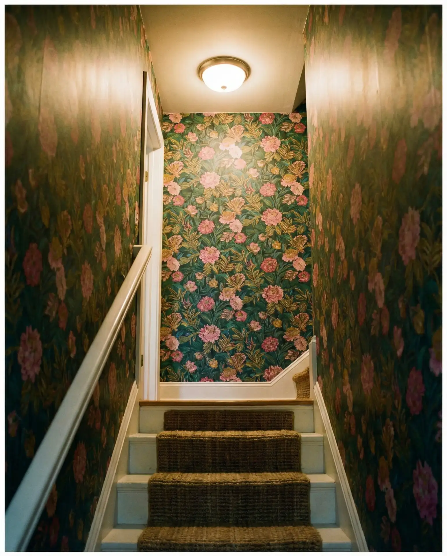 Narrow Enclosed Staircase with Bold Wallpaper 1