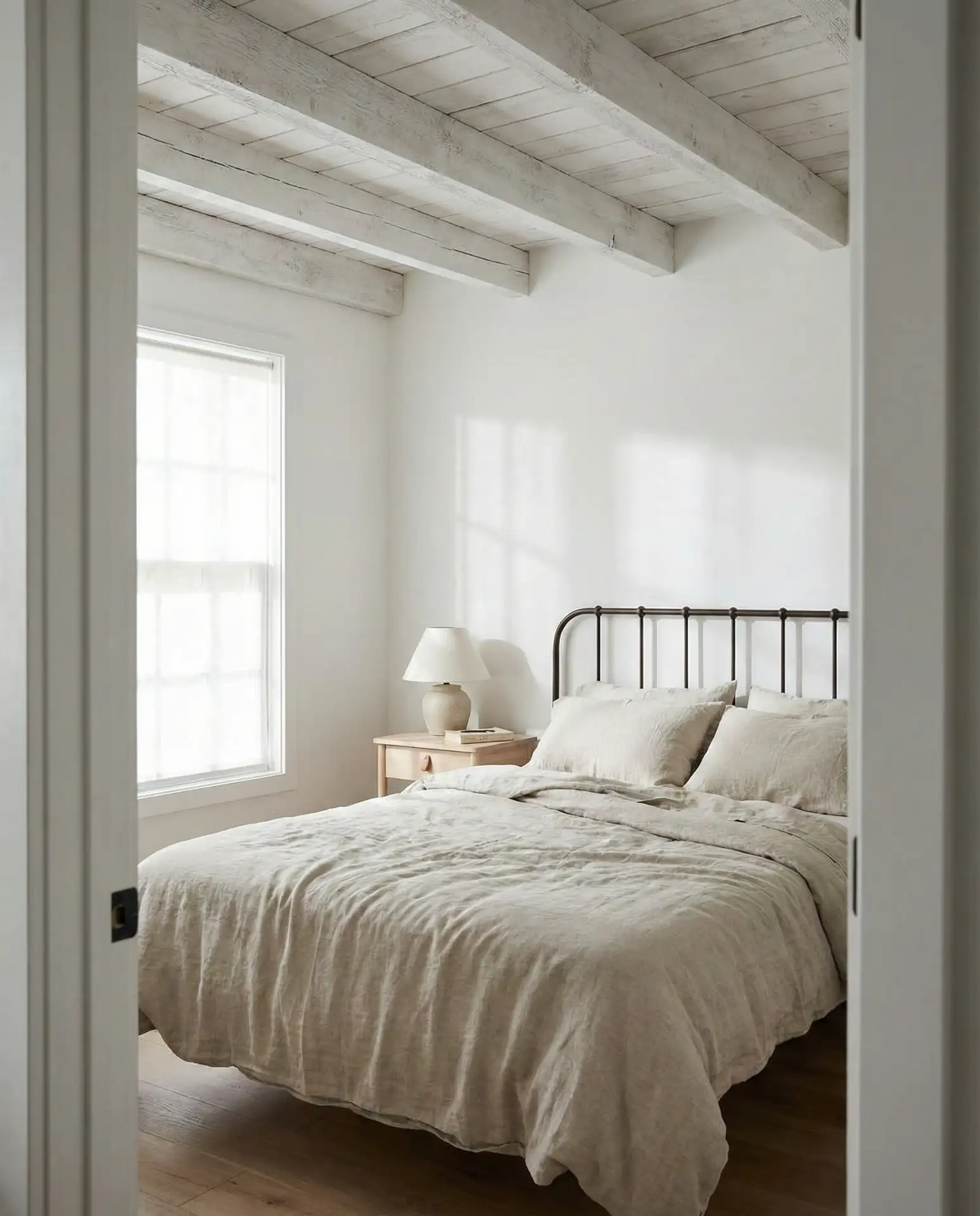 Ranch Style Bedroom with Whitewashed Wood and Linen 2