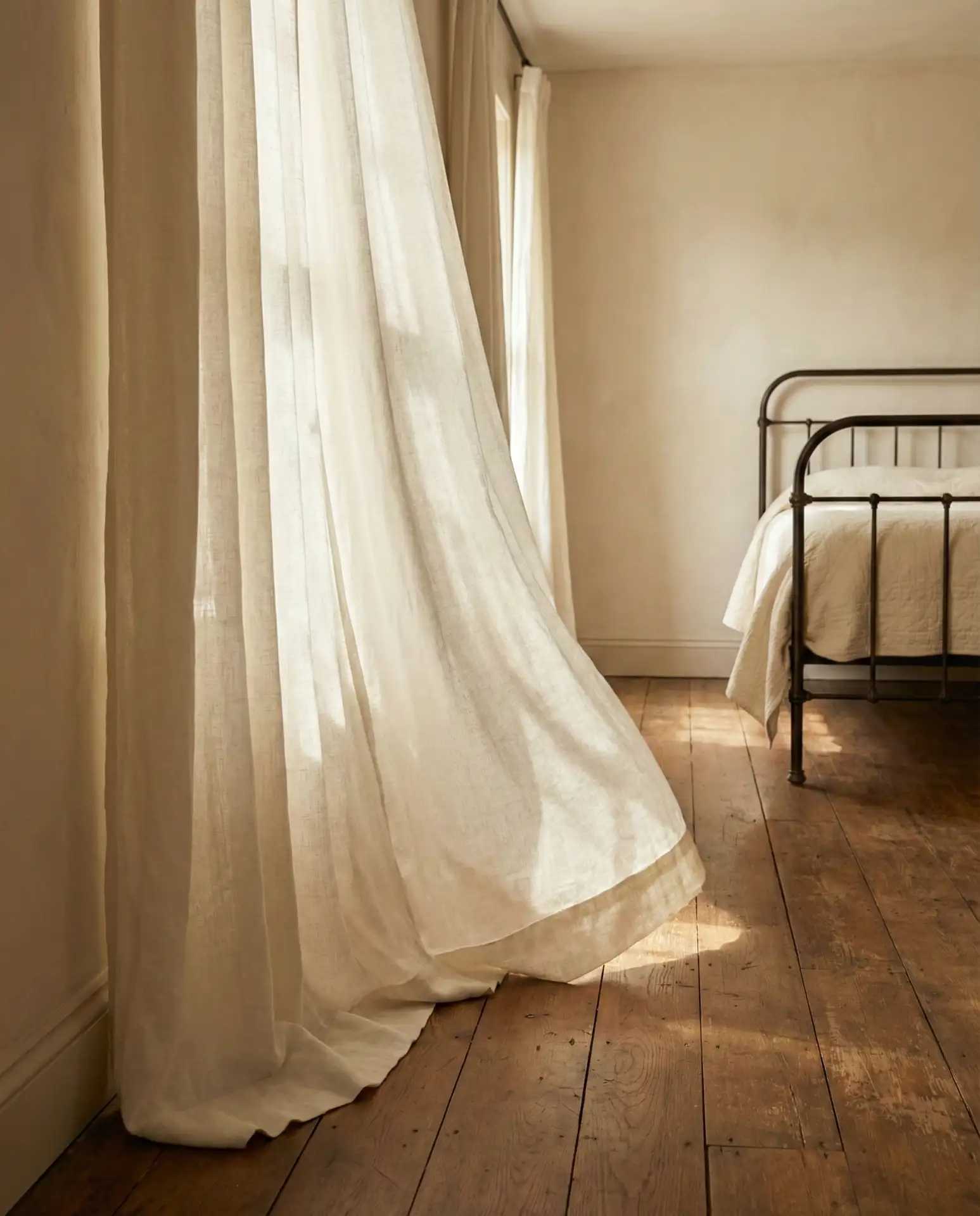 Soft Linen Curtains in a Sunlit Bedroom 1