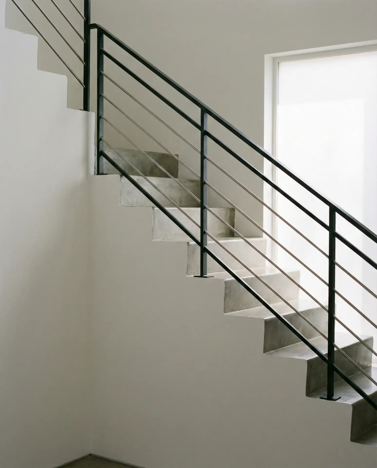 Straight Staircase with Minimalist Steel Handrail 1