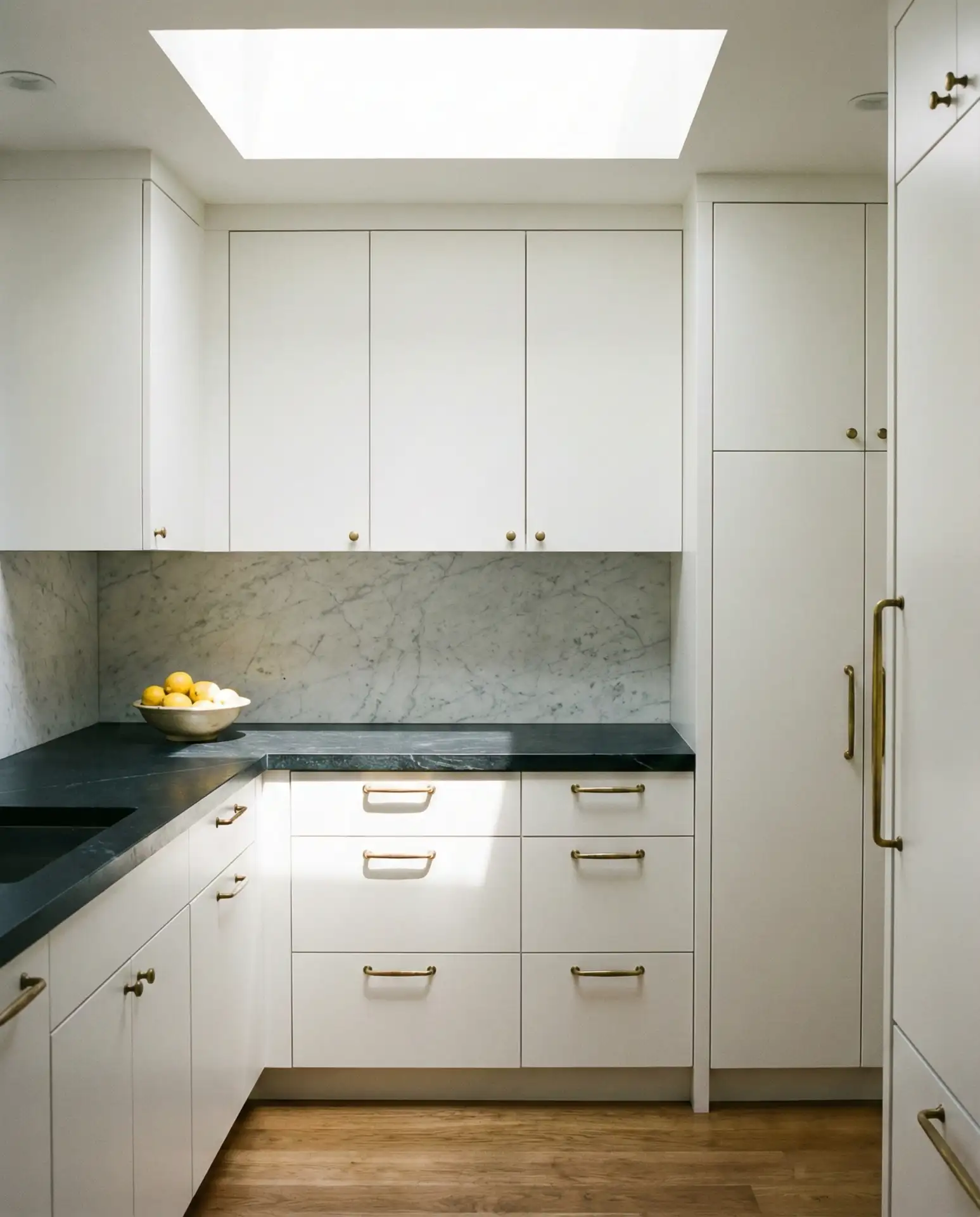 White Cabinets with Black Countertops 1