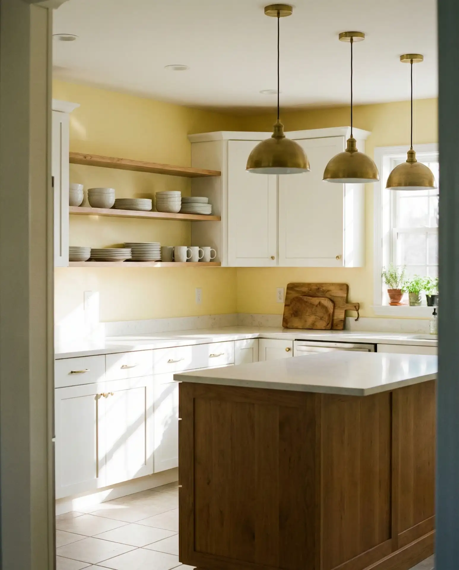 Yellow Walls with White Cabinets and Brass Details 2