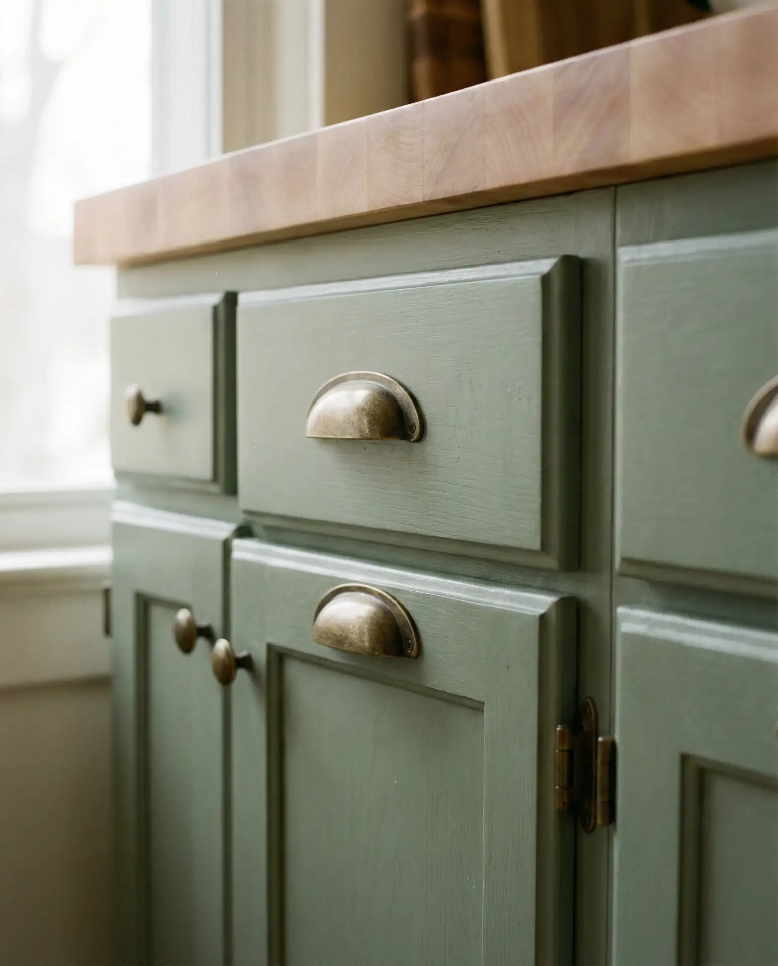 Green Cabinets with Brass Hardware 1