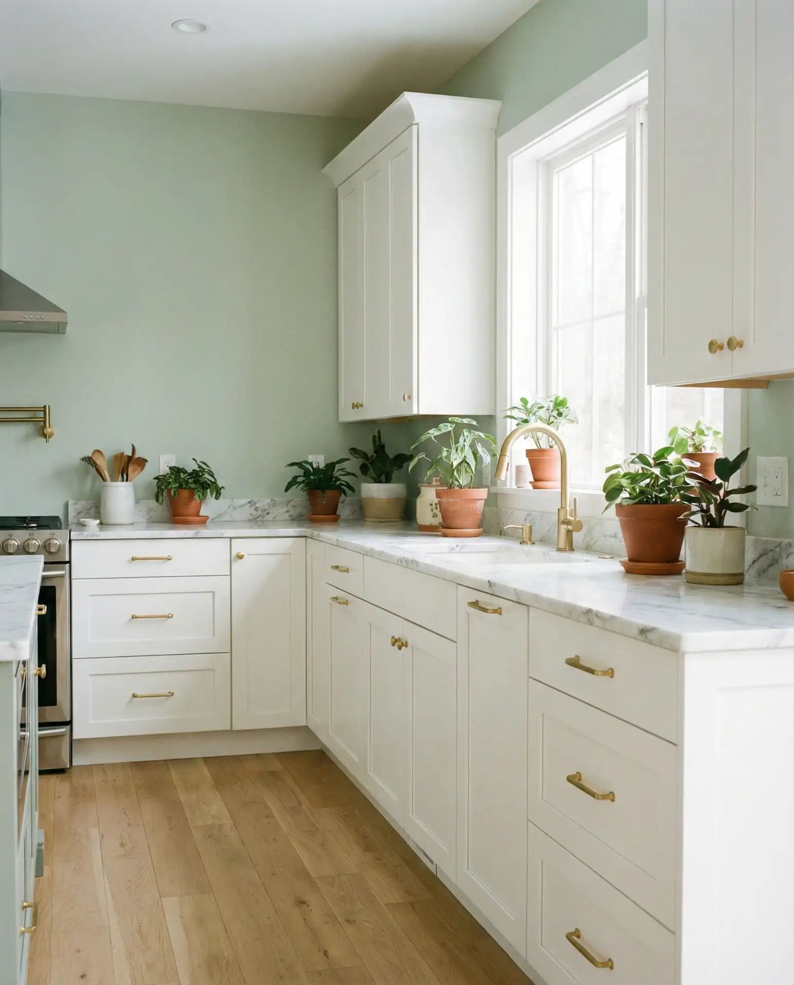 Light Sage Green Walls with White Cabinets 2