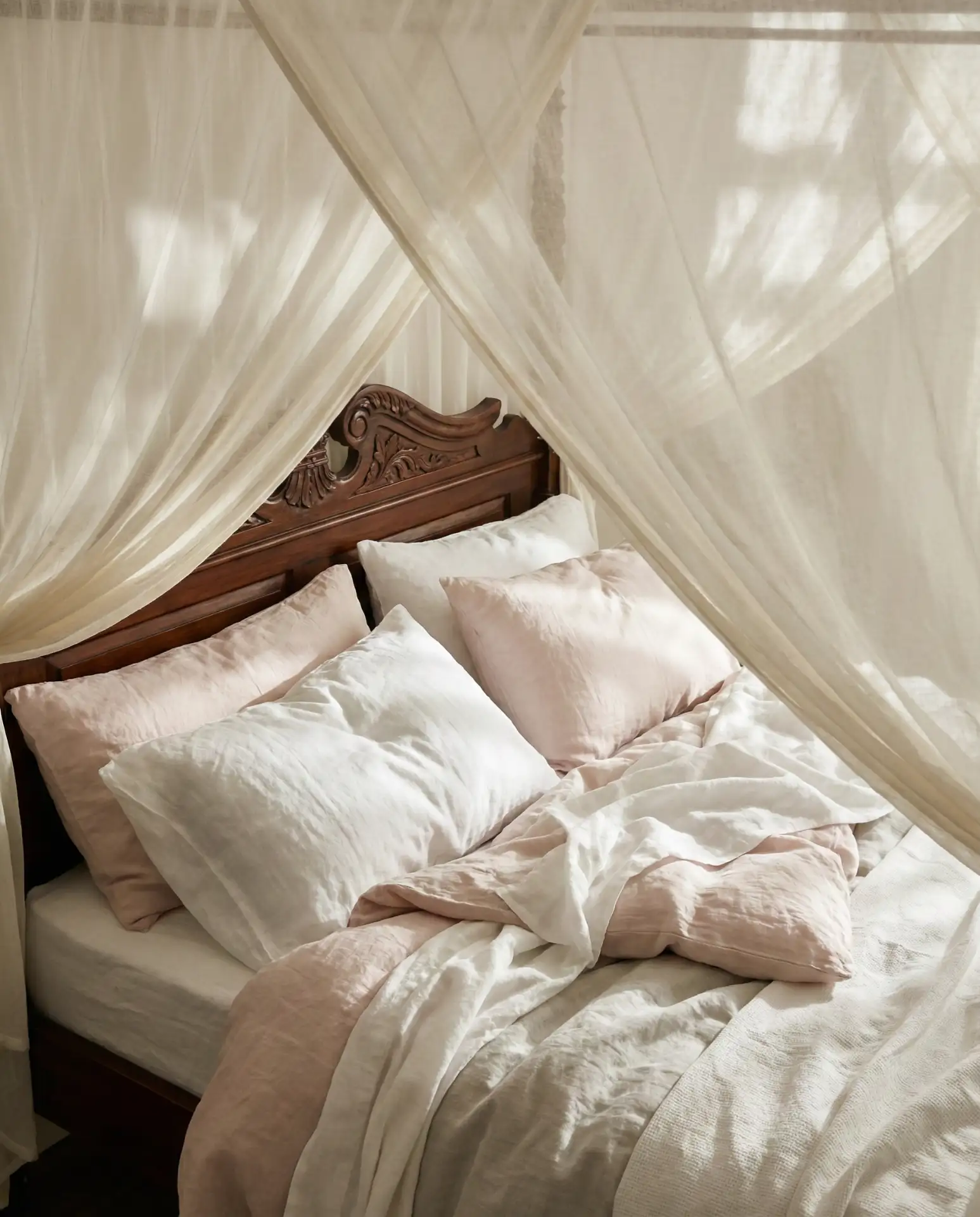 Romantic Canopy Bed With Draped Fabrics 1