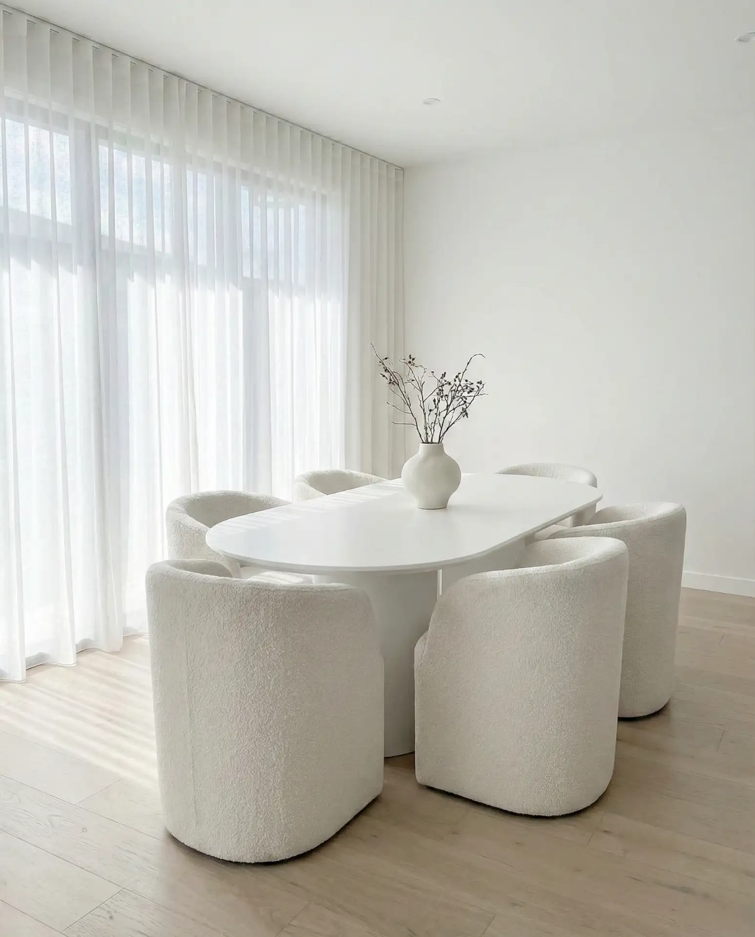 White Dining Chairs That Keep Things Light and Open 1