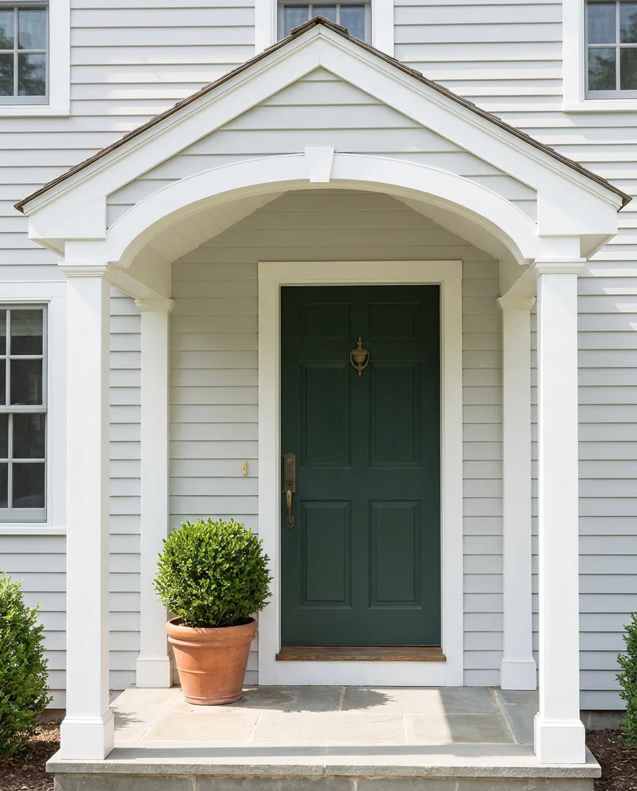 Bold Green Entry Door on a Light-Colored Cape Cod 1
