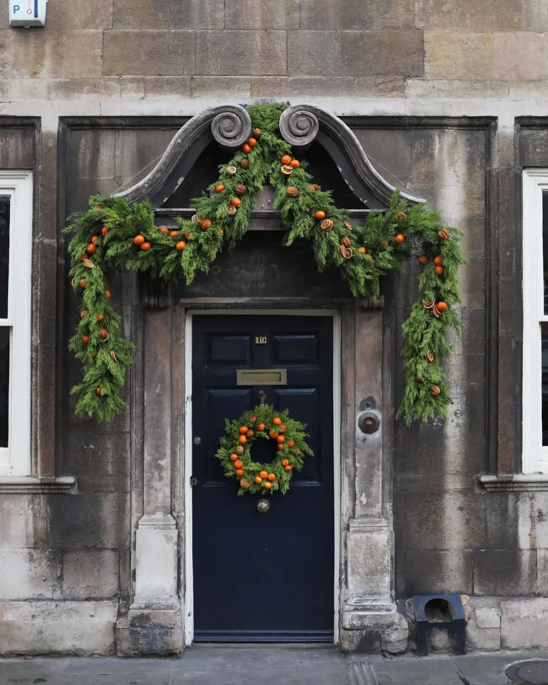 15 Christmas Door Decoration Ideas (With Inspiring Photos) | Apartment  Therapy