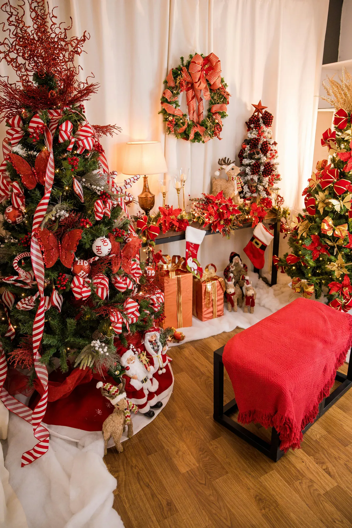 a living room filled with lots of christmas decorations