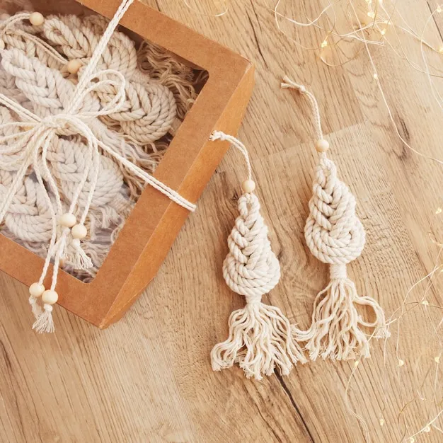 Christmas tree macrame toys on wooden boad natural materials cotton thread  wood beads and stick eco decorations ornaments hand made decor winter and  new year holidays - Stock Image - Everypixel