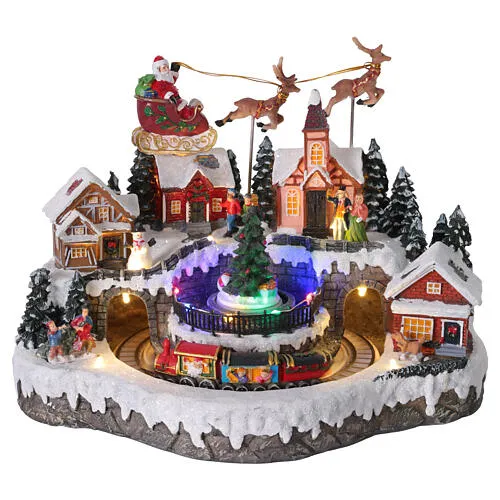 Christmas Village with Animated Santa's Sleigh Lights and Music 35x25x25 cm | online sales on HOLYART.com