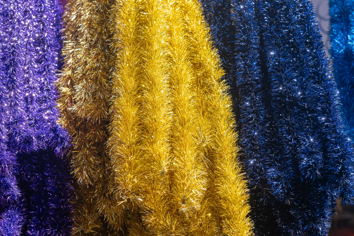 Colorful tinsel garlands displayed in İzmir, perfect for holiday decoration and festive themes.