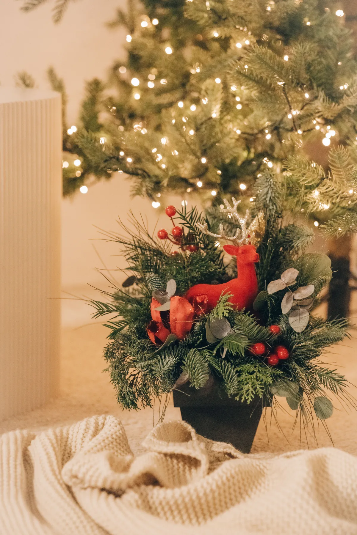 Festive Holiday Decor with Red Reindeer Figure · Free Stock Photo