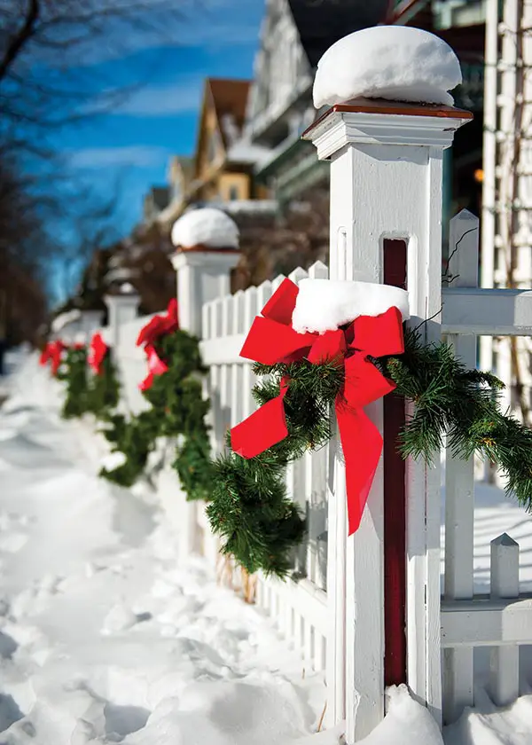 Red ribbon on fence - The Irish Card Shop