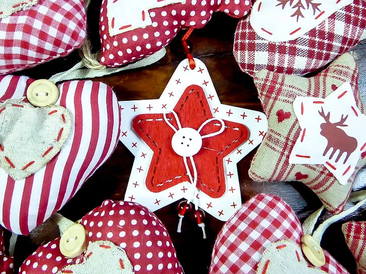Royalty-Free photo: Assorted-color star and heart pillows on brown wooden  surface | PickPik