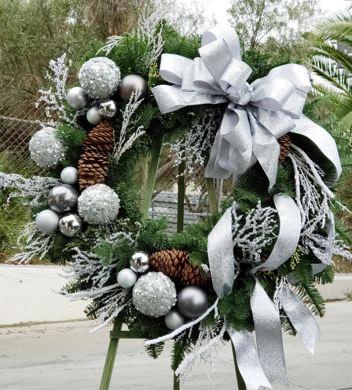 Silver magical Christmas Wreathby Floral Design by Dave's Flowers
