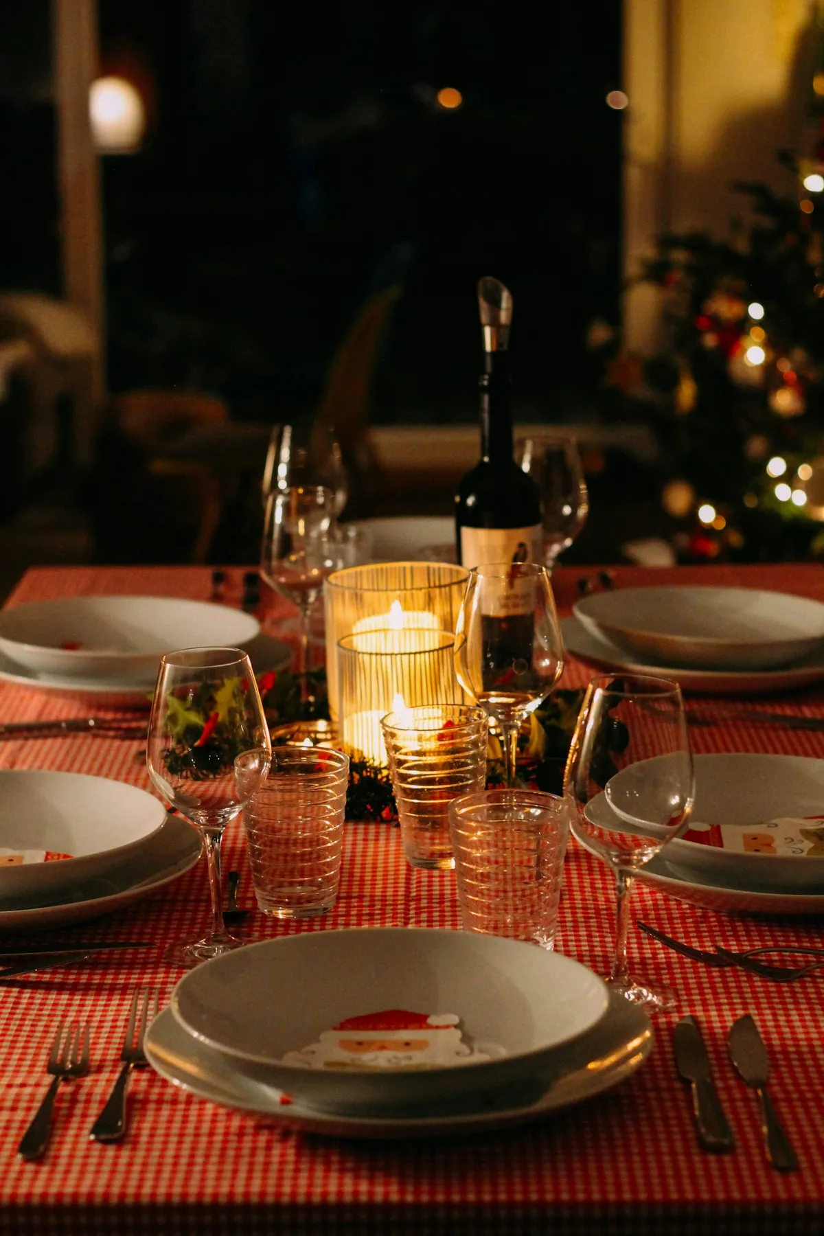 wine glasses on red ceramic plate
